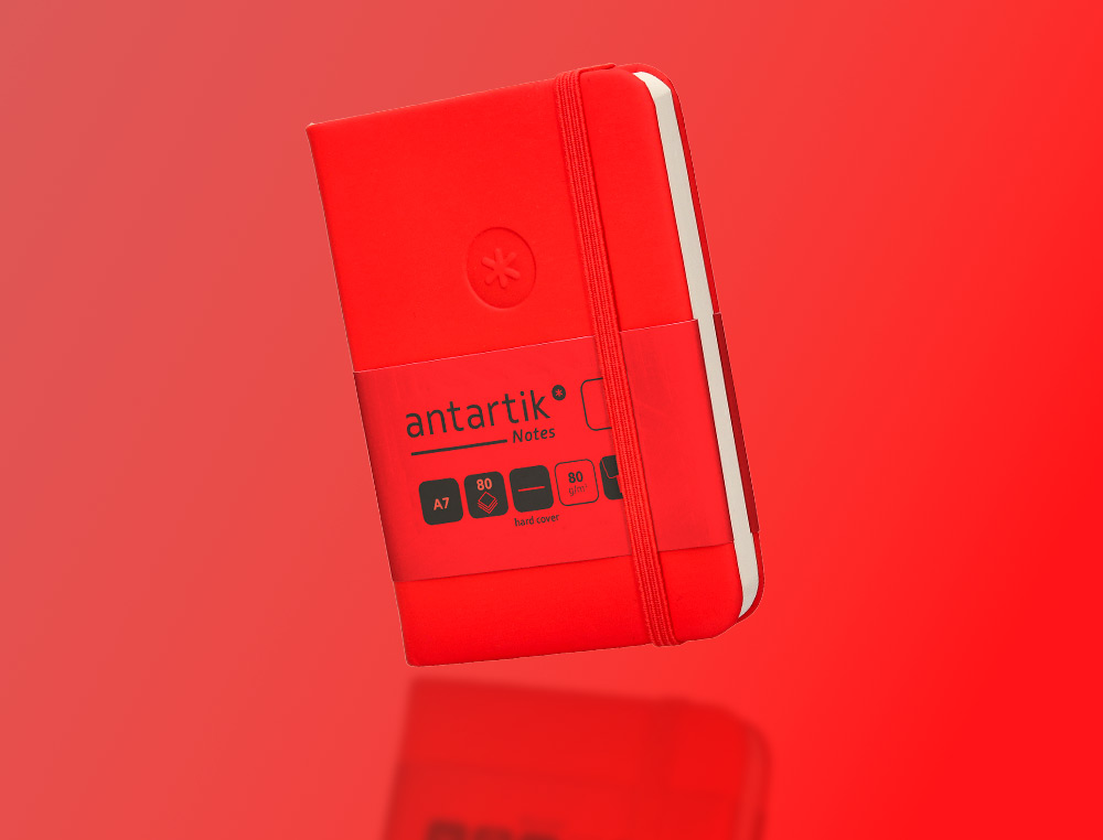 CARNET A7 ANTARTIK NOTES PAPIER UNI IVOIRE COUVERTURE RIGIDE FERMETURE ELASTIQUE 80 PAGES 80GR COLORIS ROUGE