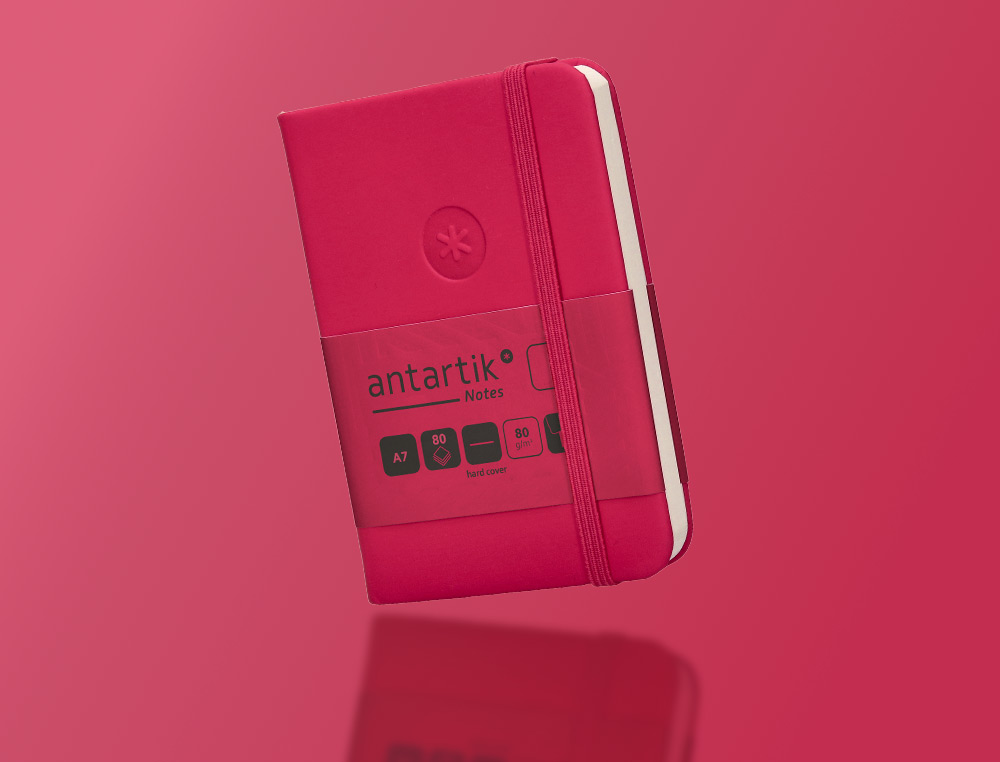CARNET A7 ANTARTIK NOTES PAPIER UNI IVOIRE COUVERTURE  RIGIDE FERMETURE ELASTIQUE 80 PAGES 80GR COLORIS FRAMBOISE